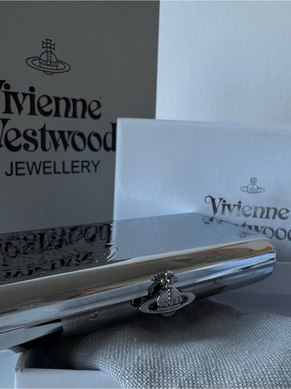 Vivienne Westwood Metallic Silver Orb Clutch Phone Case